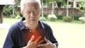 Asian senior man chest pain heart attack stroke health care Royalty Free Stock Photo