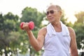 Asian Senior man lifting dumbbell. Royalty Free Stock Photo