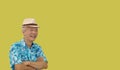 Asian senior man retired elderly in hawaii shirt straw hat happy vacation mode isolated copy space background