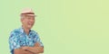 Asian senior man retired elderly in hawaii shirt straw hat happy vacation mode isolated copy space background