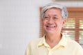 Asian senior man smile in living room at home,Happy aging at home concept Royalty Free Stock Photo