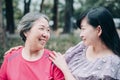 Asian senior mother and her adult daughter are hugging Royalty Free Stock Photo