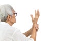 Asian senior people showing hands tremors,shaking of Parkinson`s disease,old elderly with painful or numbness of the hand and Royalty Free Stock Photo
