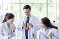 Asian senior scientist have teaching young student scientist in a laboratory Royalty Free Stock Photo