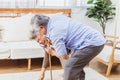 Asian senior woman falling down lying on floor at home Royalty Free Stock Photo