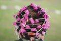 Asian senior woman with hair roller Royalty Free Stock Photo