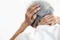 Asian senior woman suffering from scruff pain,occipital bone,stiffness neck,elderly female with painful in the nape of the neck Royalty Free Stock Photo