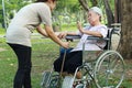 Asian senior woman who refuses to walk,female elderly afraid of getting up from wheelchair,old people fear of falling,geriatric