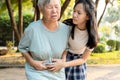 Asian senior woman hands touching stomach painful,sick female patient feel acute pain symptoms gastrointestinal system disease,gut Royalty Free Stock Photo