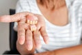 Seniors hold removable dentures