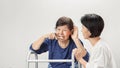 Asian seniors woman hearing loss ,Hard of hearing