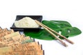 Asian set of rice, chopsticks, green leaf and transp Royalty Free Stock Photo