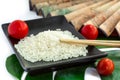 Asian set of rice, tomatoes, chopsticks, green leaf and trans Royalty Free Stock Photo