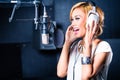 Asian singer producing song in recording studio Royalty Free Stock Photo