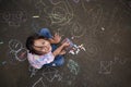 Asian small girl with chalk Royalty Free Stock Photo