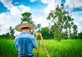 Asian smart engineer or surveyor is working on controller screen