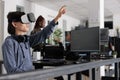 Asian software developer using virtual reality goggles to code new server interfac Royalty Free Stock Photo