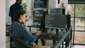 Asian software engineer working on security program with server code Royalty Free Stock Photo