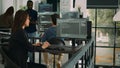 Asian software engineer working with user interface on computer screen Royalty Free Stock Photo