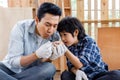 Son has splinter of wood in his finger Royalty Free Stock Photo