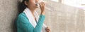 sporty woman drinking water to rehydrate after jogging exercise