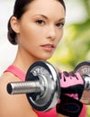 Asian sporty woman with heavy dumbbell Royalty Free Stock Photo