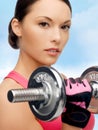 Asian sporty woman with heavy dumbbell Royalty Free Stock Photo