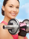 Asian sporty woman with heavy dumbbell Royalty Free Stock Photo