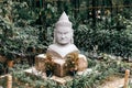 Asian statue in Angkor Botanical Garden, Cambodia Royalty Free Stock Photo