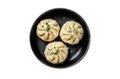 Asian Steamed Dumplings Manti in a pan. Isolated, white background.