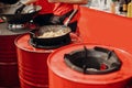 Asian street food festival in city. Chef cooking noodles and vegetables in a pan on fire. Fried chinese japanese noodles with Royalty Free Stock Photo