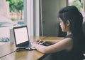 asian student girl learning, studying online using laptop computer in room Royalty Free Stock Photo