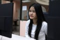 Asian Student Learning on Computer in Classroom Technology Environment Royalty Free Stock Photo