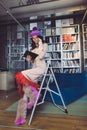 Asian student reading book in the library Royalty Free Stock Photo