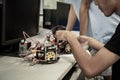 Asian Student thinking and learning STEM Education robotics for creating project based studying for innovation robot model. Study