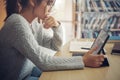 Asian student woman read books in library at university. Young girl stress tired have problem while study hard. Sadness concept Royalty Free Stock Photo