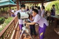 Asian students are using a Catadioptric Telescope. Royalty Free Stock Photo