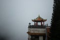 An Asian-style gazebo on top of a mountain