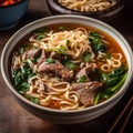 Asian style noodle soup with beef and vegetables in bowl, selective focus Royalty Free Stock Photo