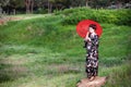 Asian style portrait of woman with umbrella Royalty Free Stock Photo
