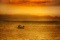 Asian sunset over water Royalty Free Stock Photo
