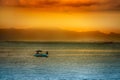 Asian sunset over water Royalty Free Stock Photo