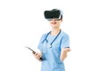 Asian surgeon use digital tablet control VR headset screen Royalty Free Stock Photo