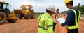 Asian surveyor engineer two people checking level of soil with Surveyor\'s Telescope equipment to measure leveling