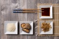 Asian table with ingredients and sticks Royalty Free Stock Photo