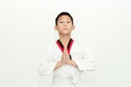 Asian taekwondo boy on gray background.