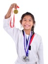 Asian taekwondo girl showing her gold meda