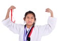 Asian taekwondo girl showing her gold medal on with background..