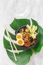 Asian take away food Two poke bowl fried rice chicken meat eggs box top view Royalty Free Stock Photo