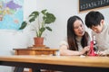 Asian teacher and child boy looking at microscope in science class at preschool - Focus on kid Royalty Free Stock Photo